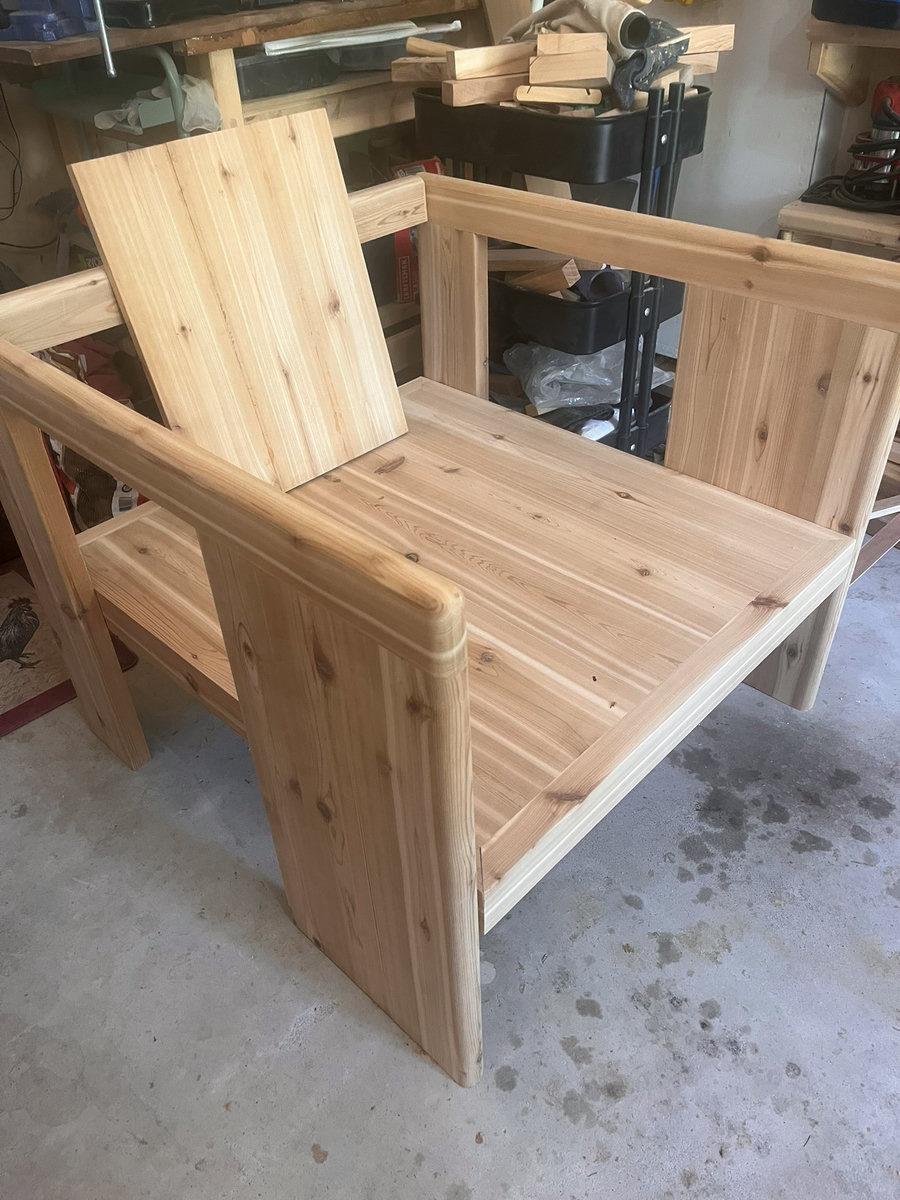 Lounge chair — back panel fitting